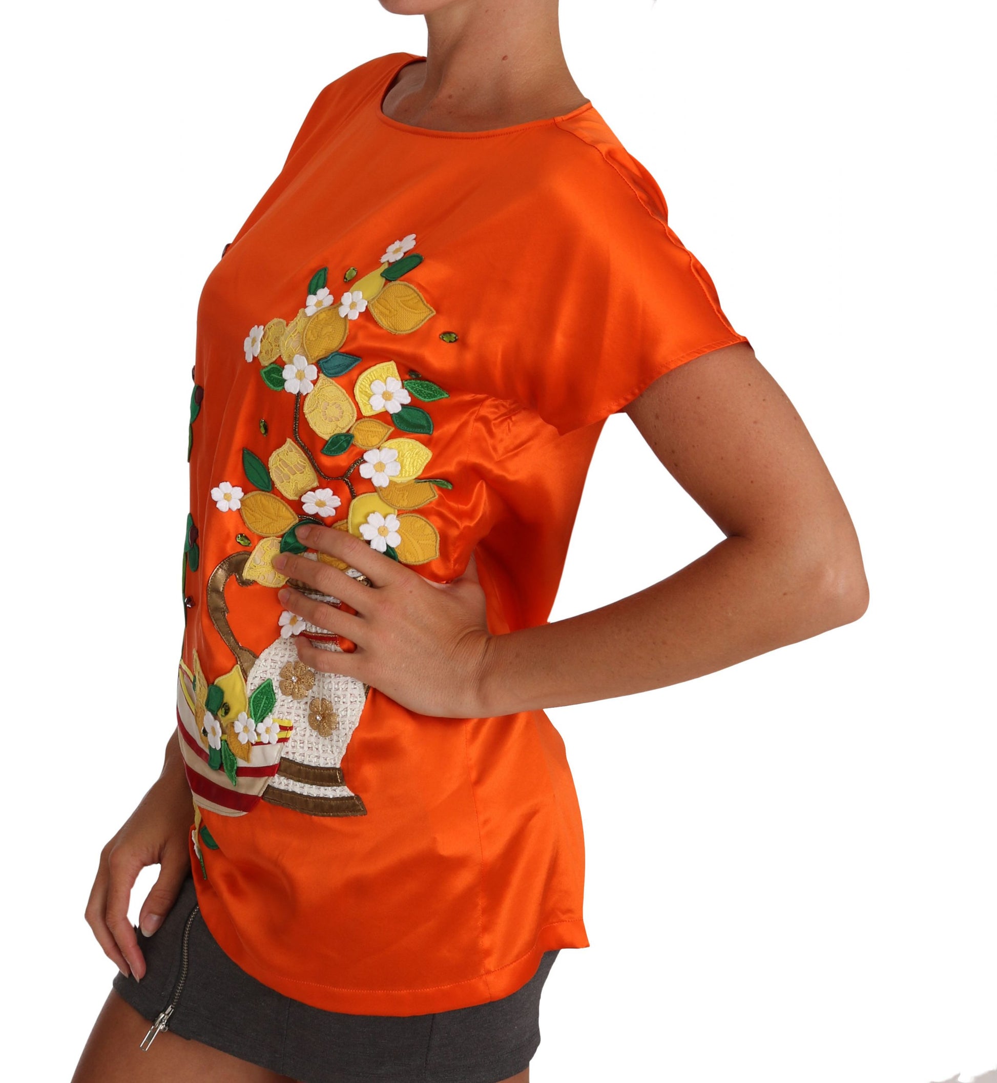 Orange shirt with floral pattern on front