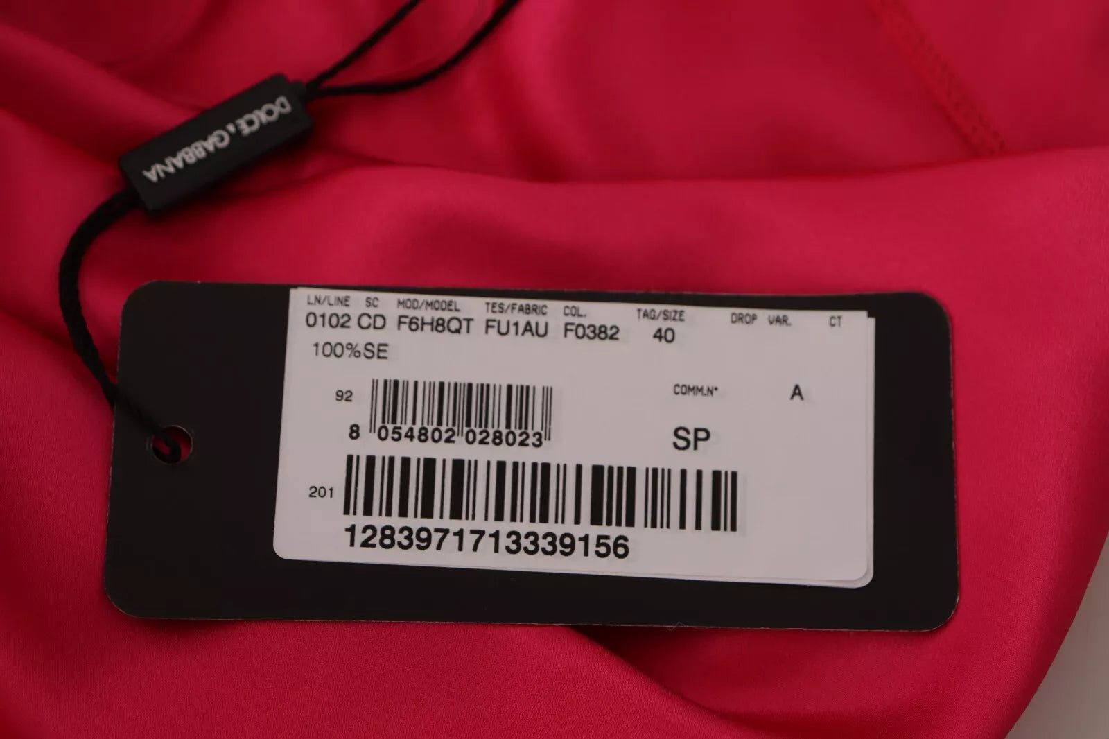 Tag on red fabric