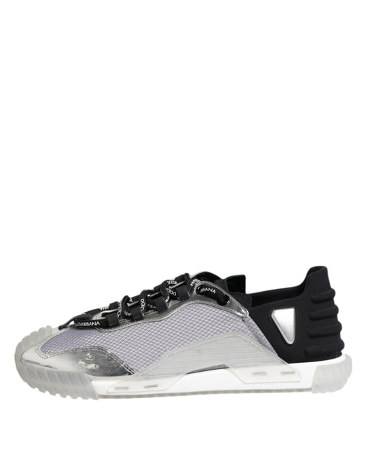 A pair of men's shoes with a silver and black nylon upper, featuring laces and a low top design