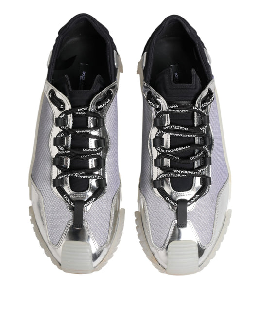 Pair of silver black nylon sneakers with laces and a low top