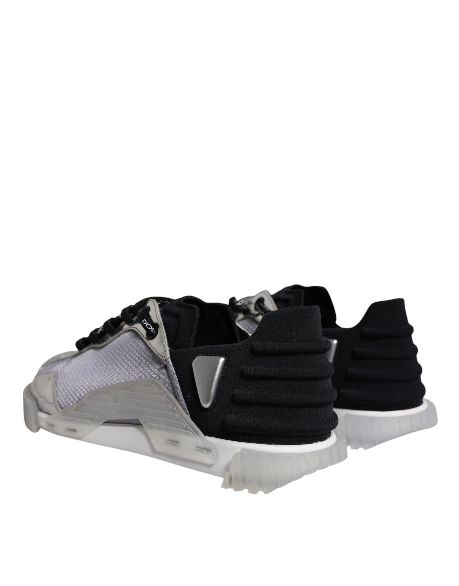 A pair of black and silver sneakers with nylon material, featuring a low top design