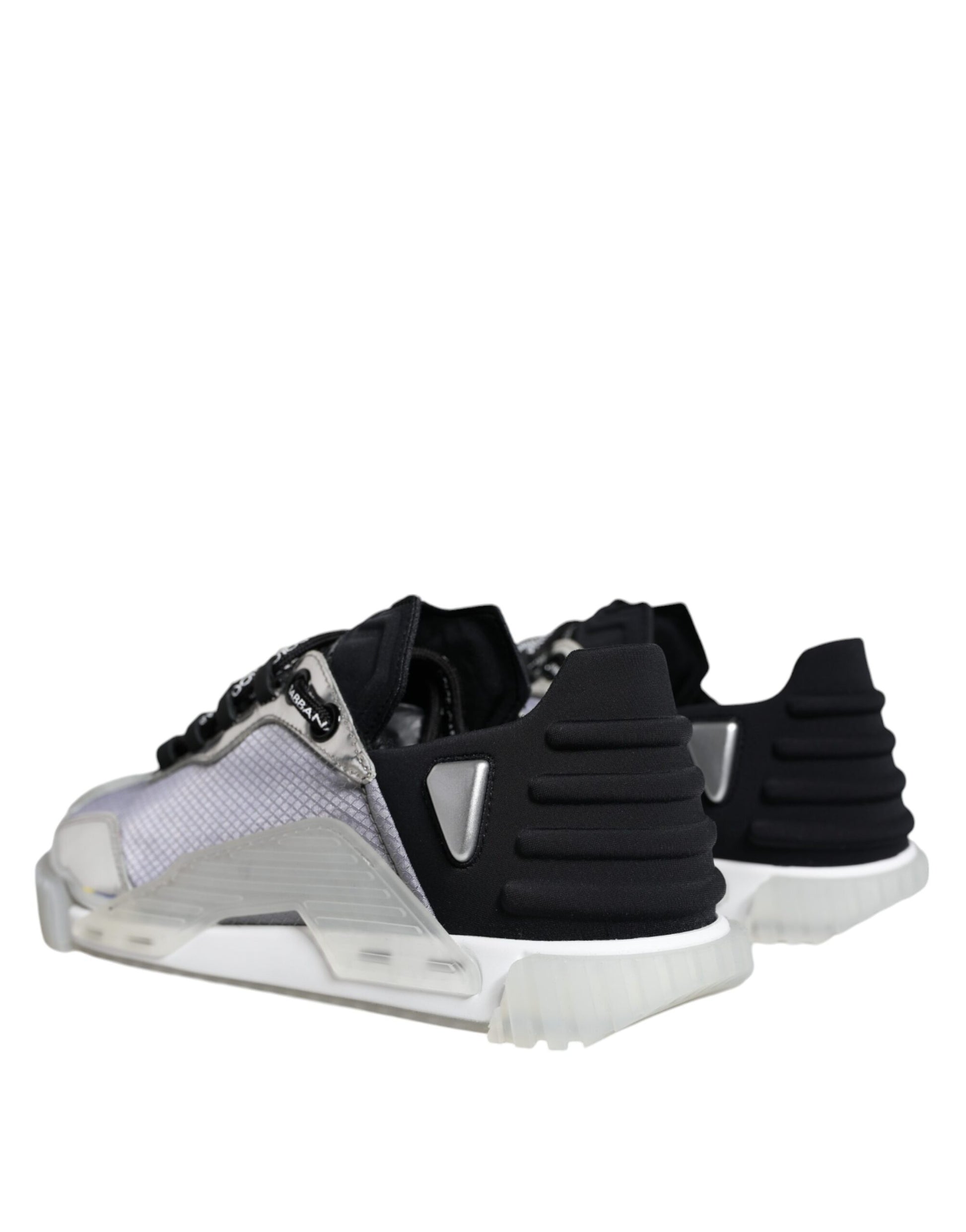 A pair of black and silver nylon sneakers with a low top, featuring a lace-up front and a chunky sole