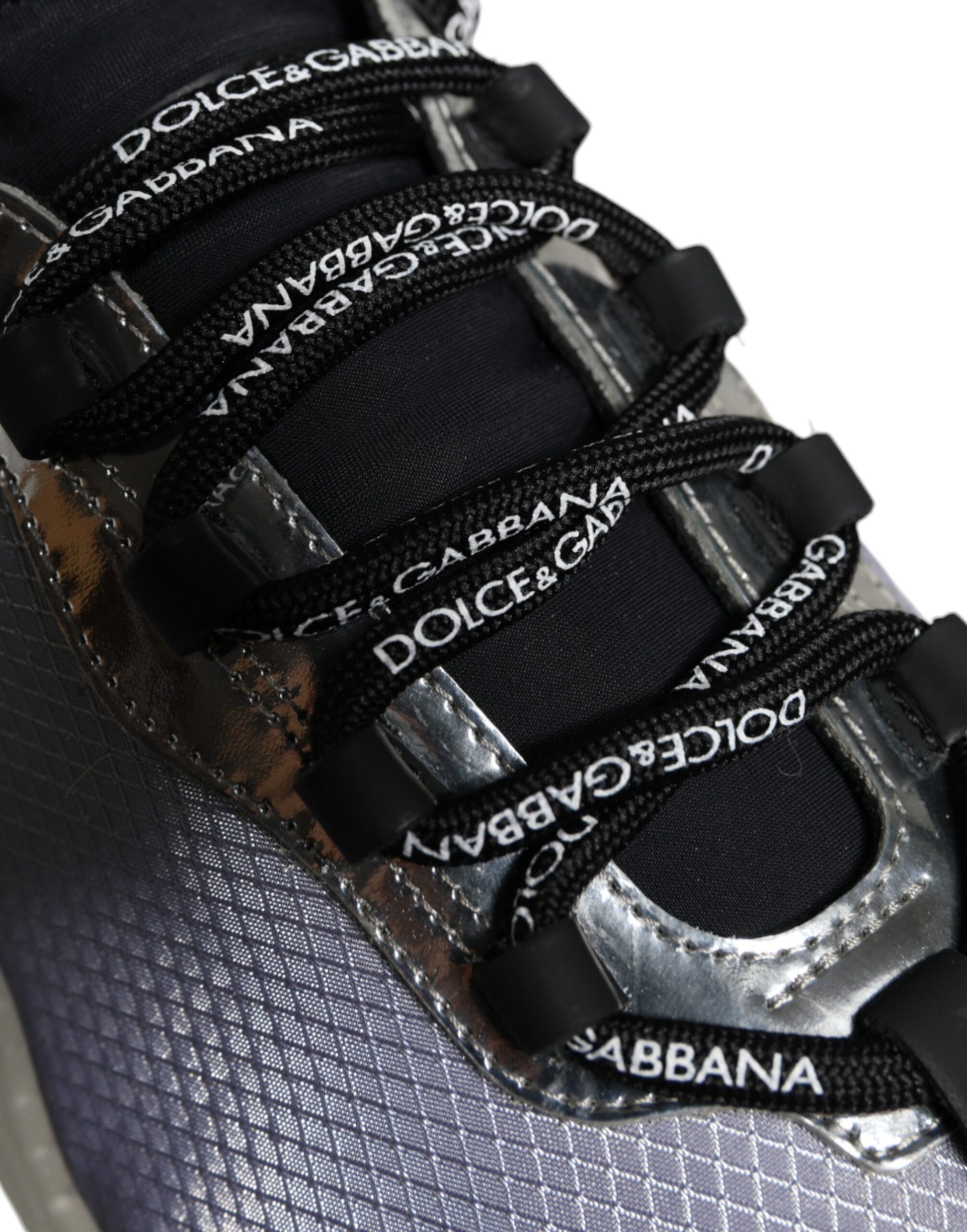A pair of silver black nylon sneakers with the Dolce & Gabbana logo
