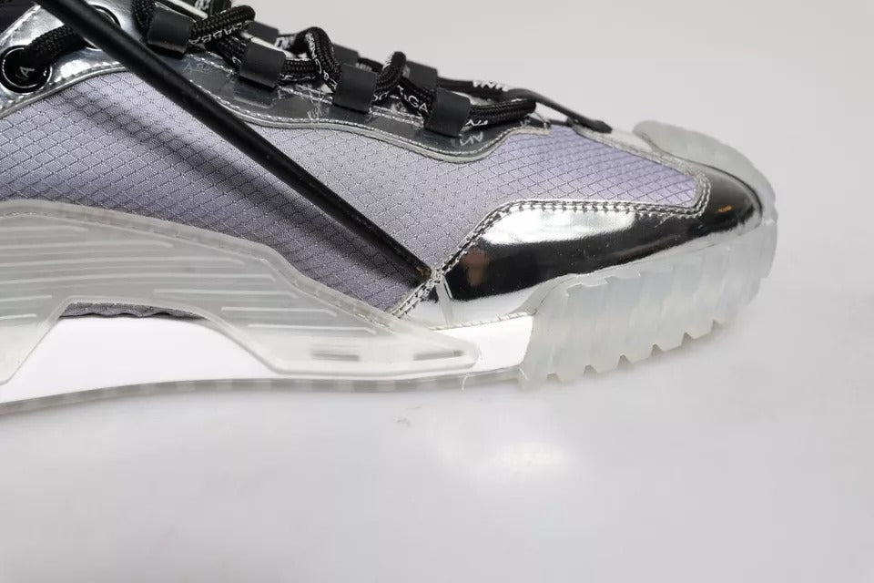 Pair of sneakers with reflective material on side