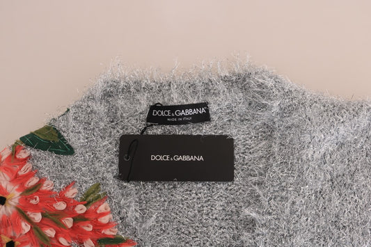 Silver sequin fabric with tags reading "Dolce & Gabbana" on a white background