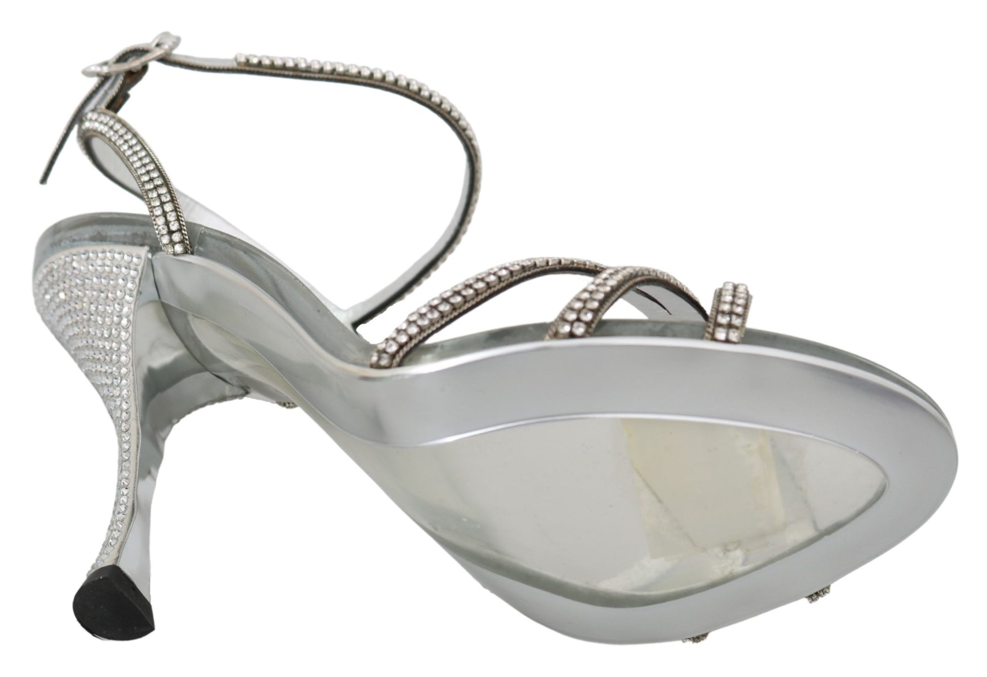 Silver high heel shoe with rhinestones and a strap over the toe