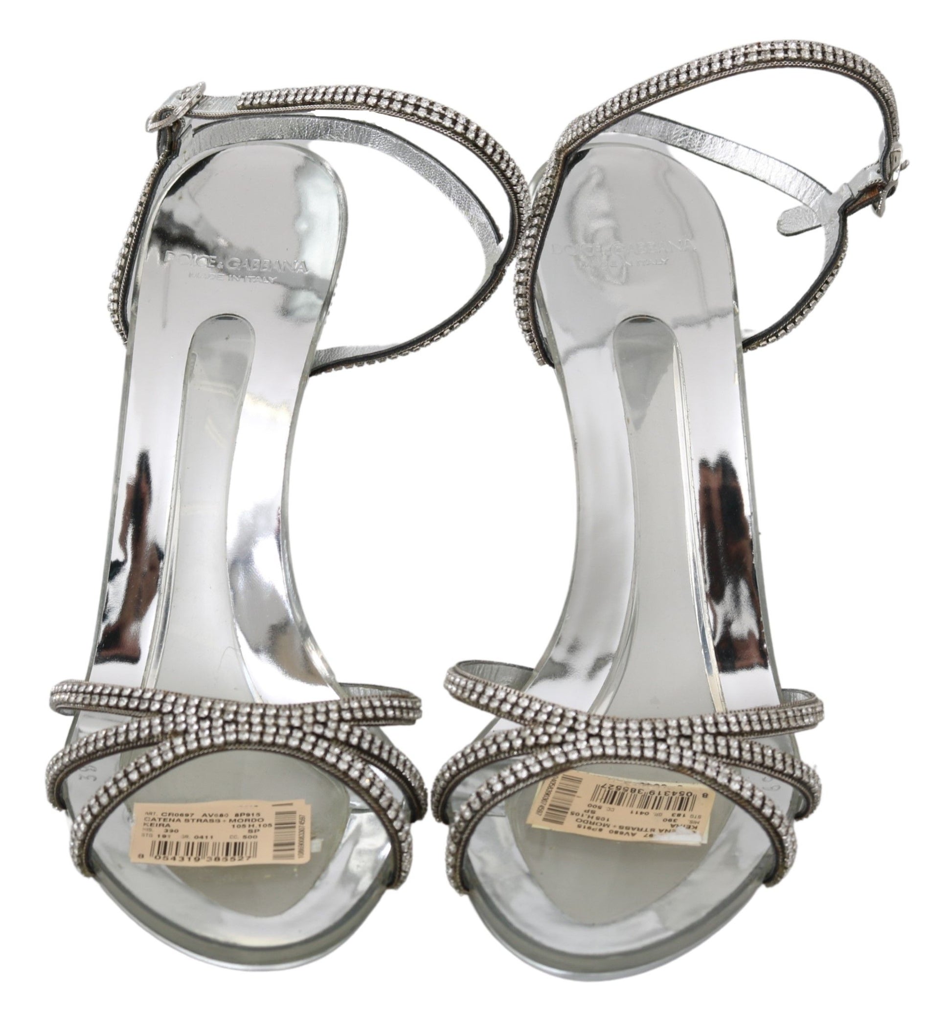 Silver high heel sandals with clear straps and embellishments