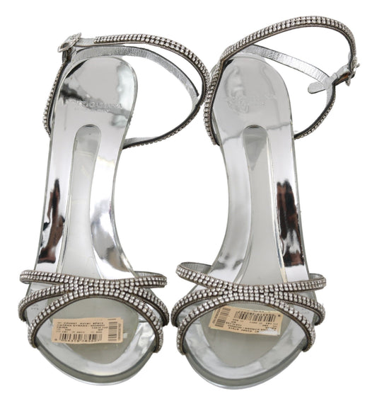 Silver high heel sandals with clear straps and embellishments