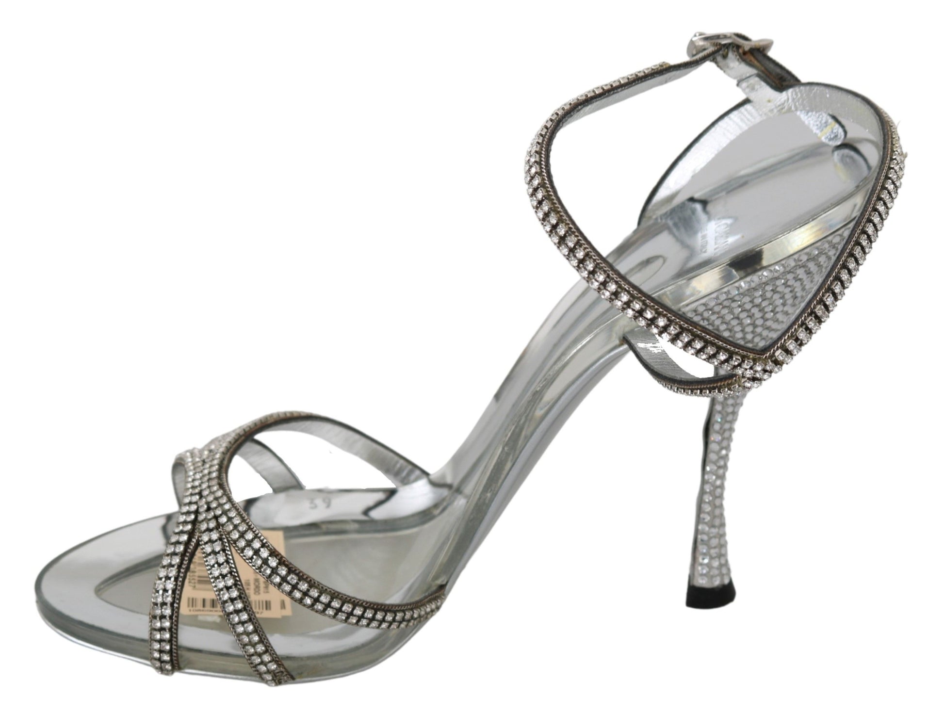 High heel shoe with rhinestones and a strap over the toe