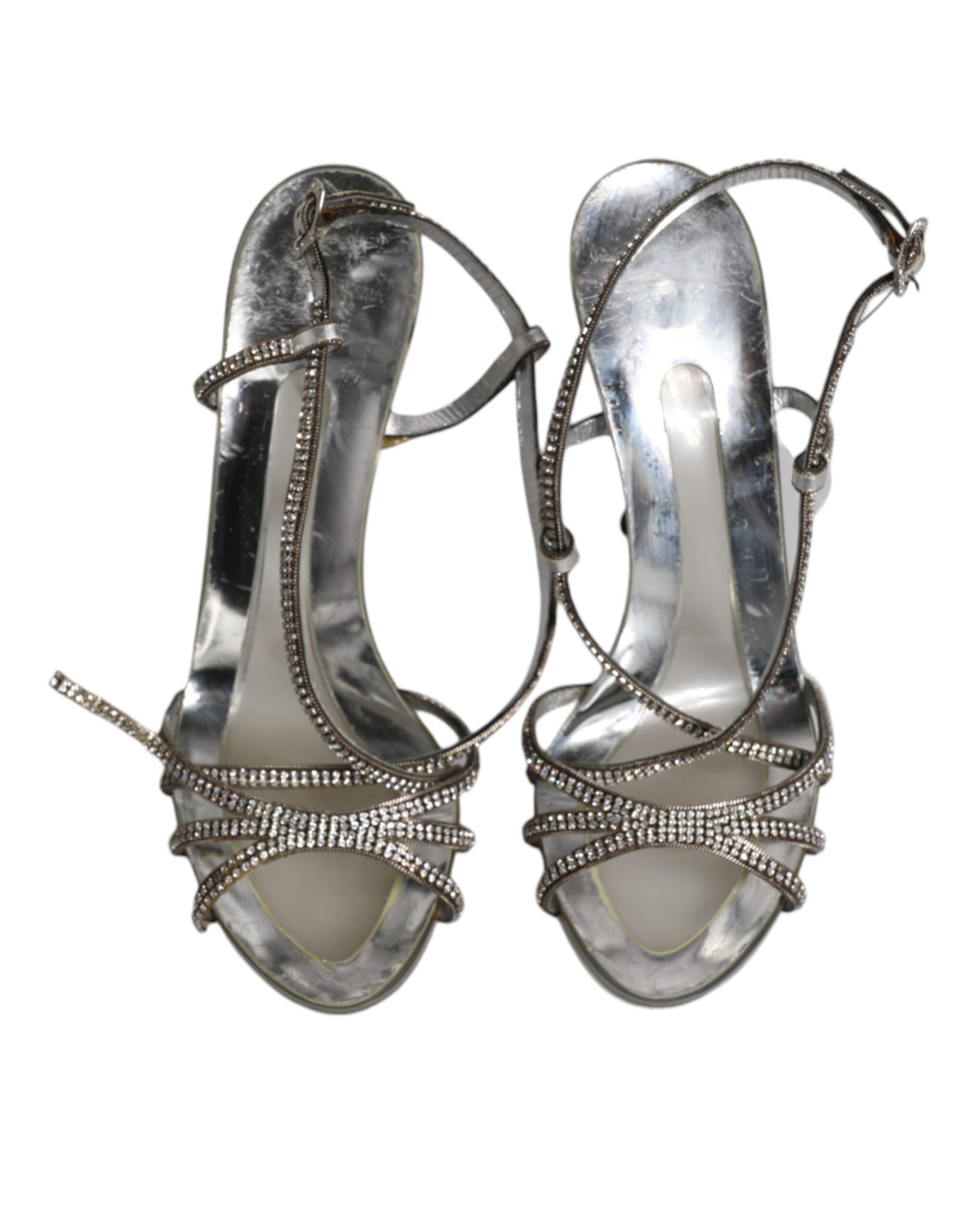 Pair of women's shoes with straps and embellishments