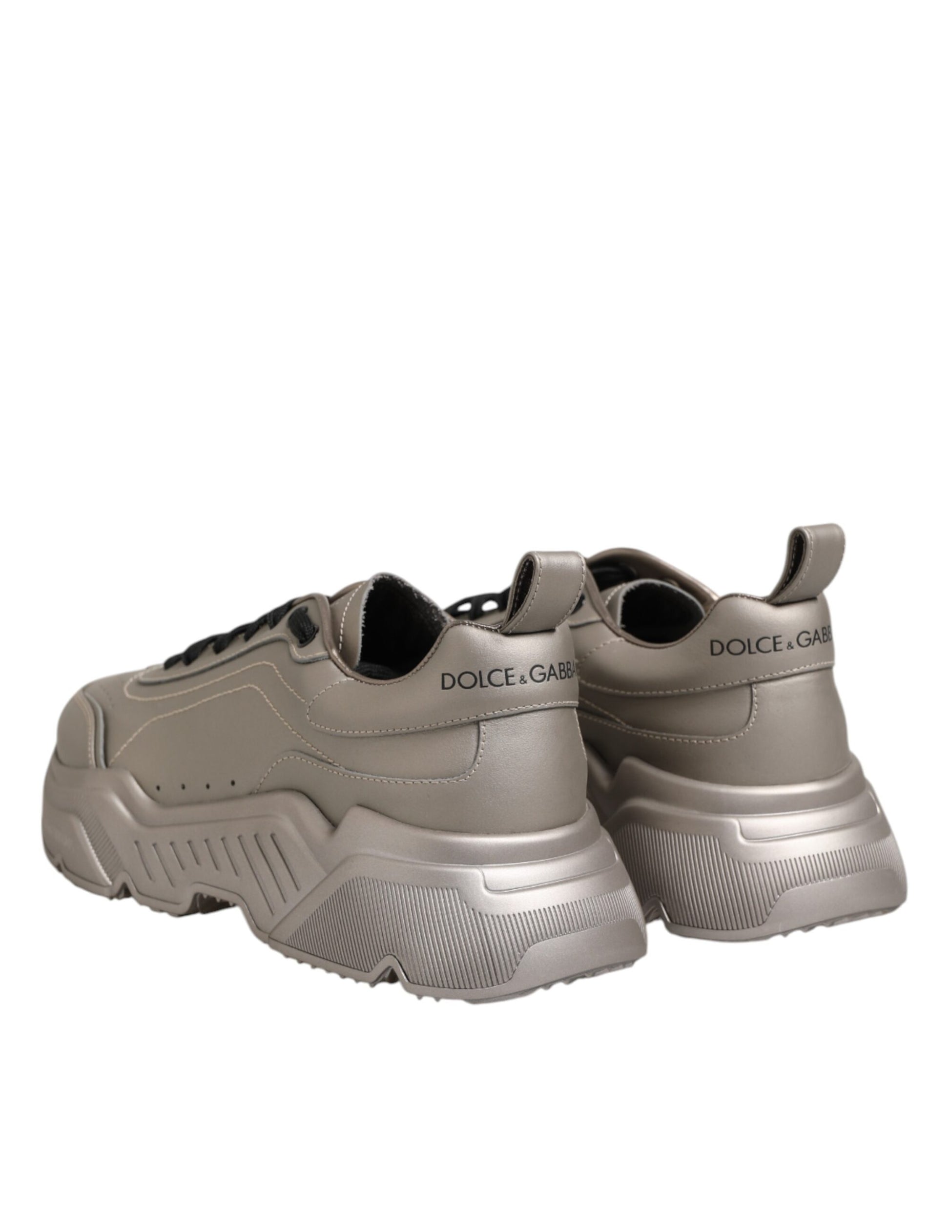 Pair of gray sneakers with black laces