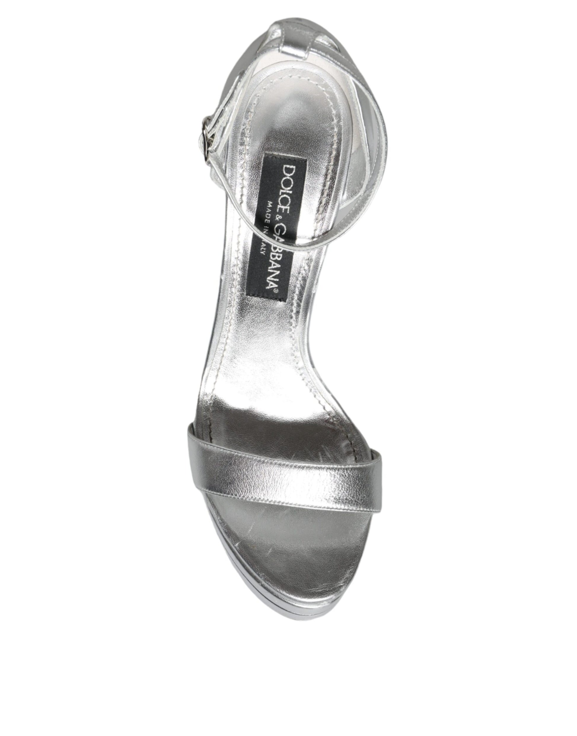 Silver high heel shoe on white background