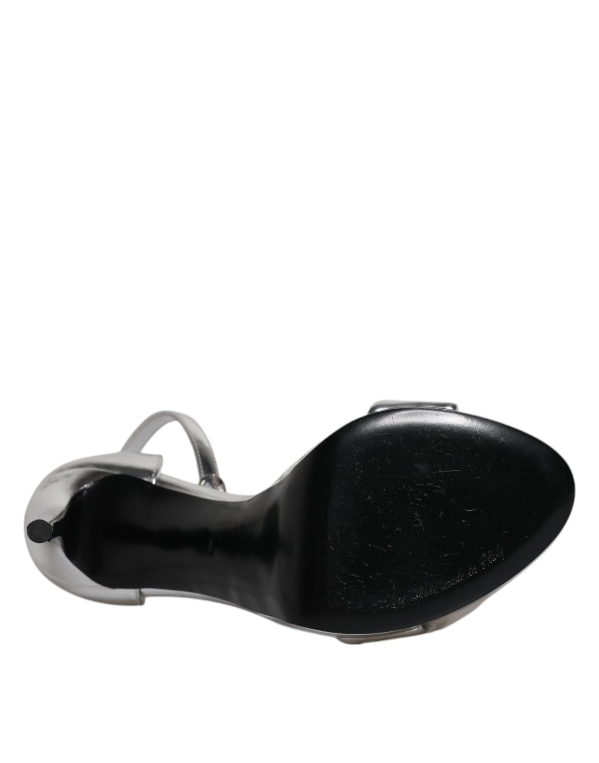Black shoe with silver buckle