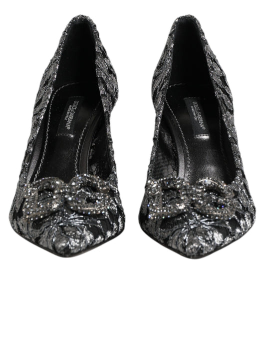Pair of black glittery women's shoes with bow detailing