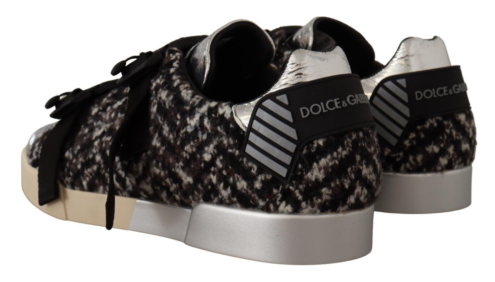 Pair of sneakers with a camouflage pattern and silver accents