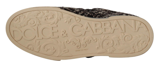 Gold shoe with embossed logo