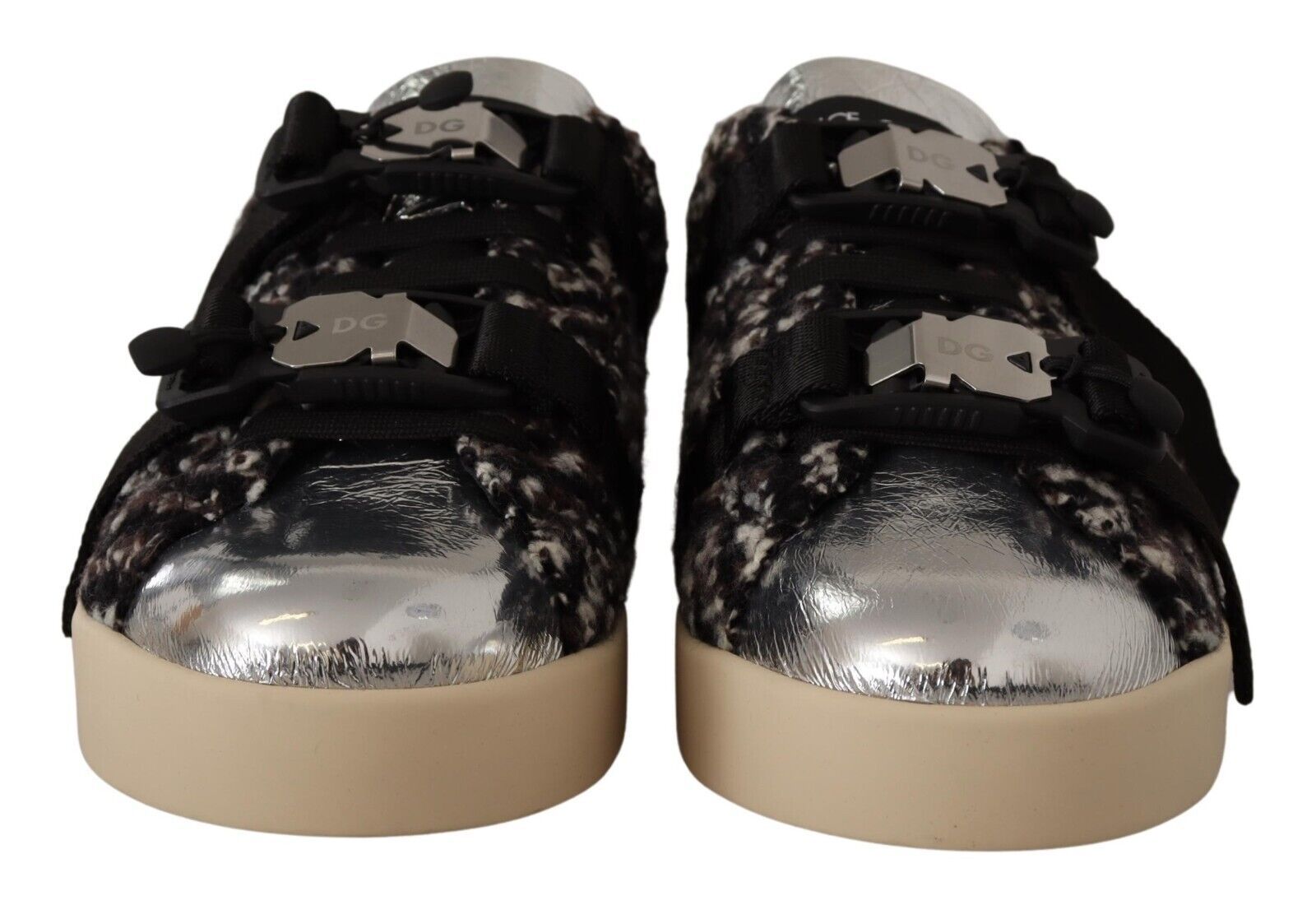 Pair of children's shoes with a glittery toe cap and a patterned upper