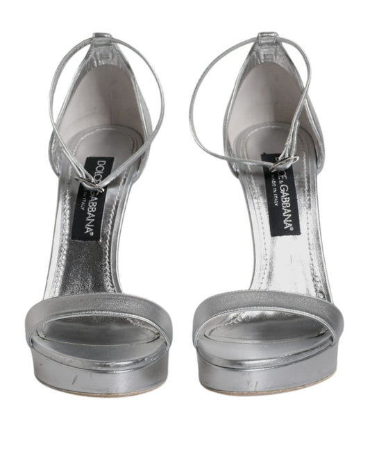 Silver high heel shoes with straps