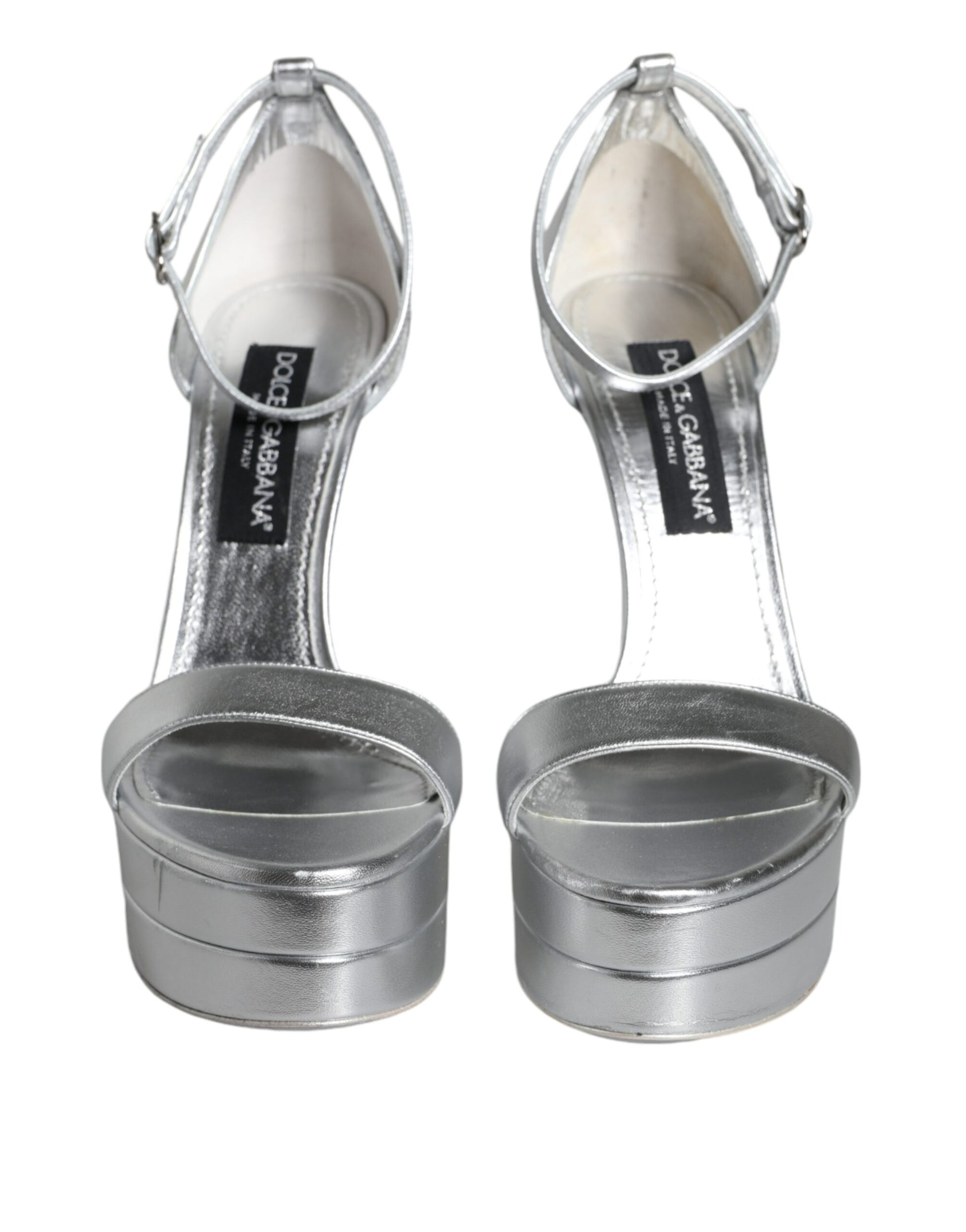 Silver high heel shoes with straps