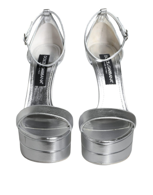 Silver high heel shoes with straps