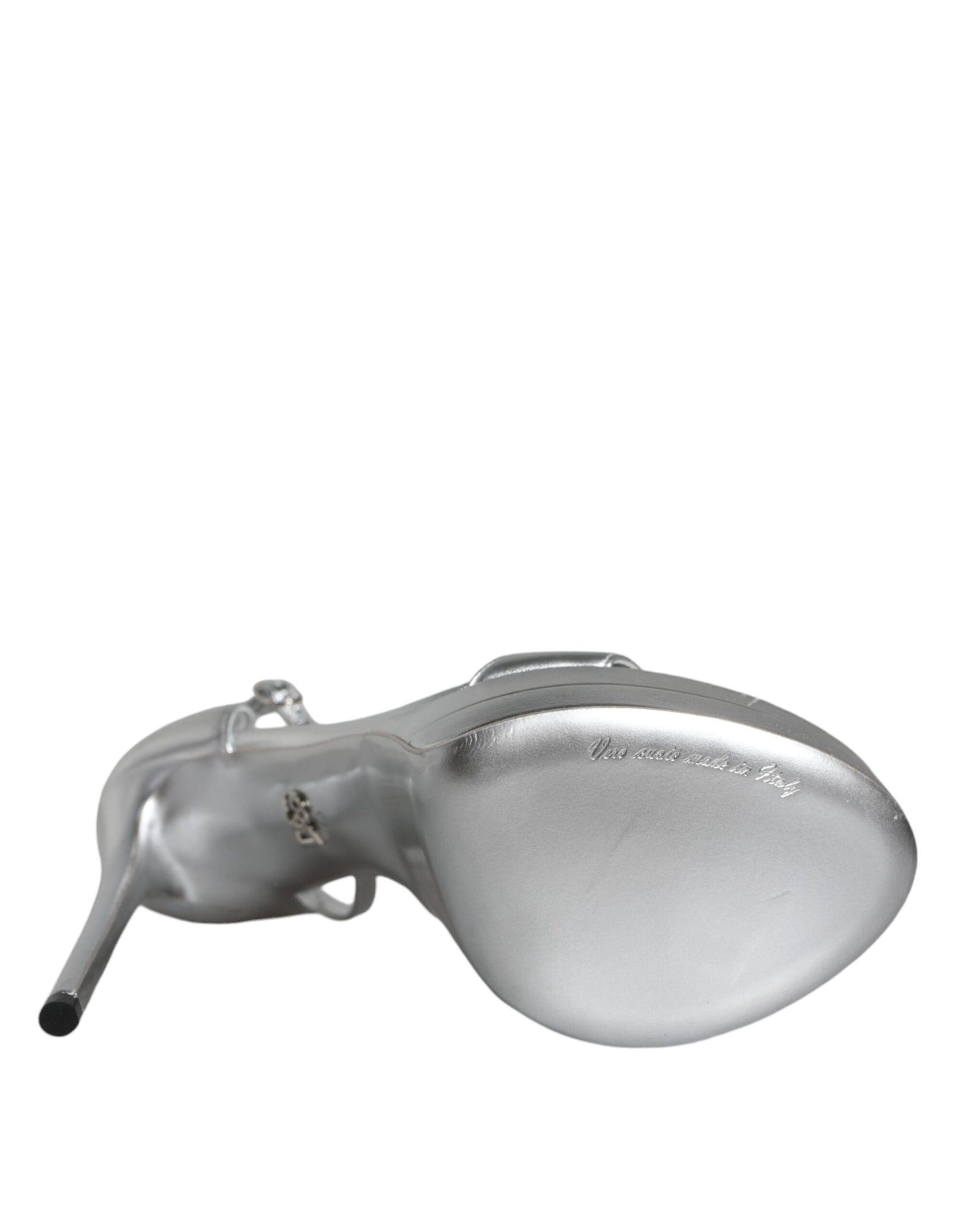 Silver hearing aid with black earpiece