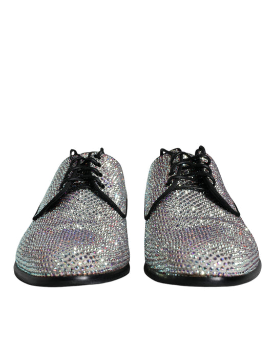 Pair of glittery silver leather shoes with rhinestone embellishments