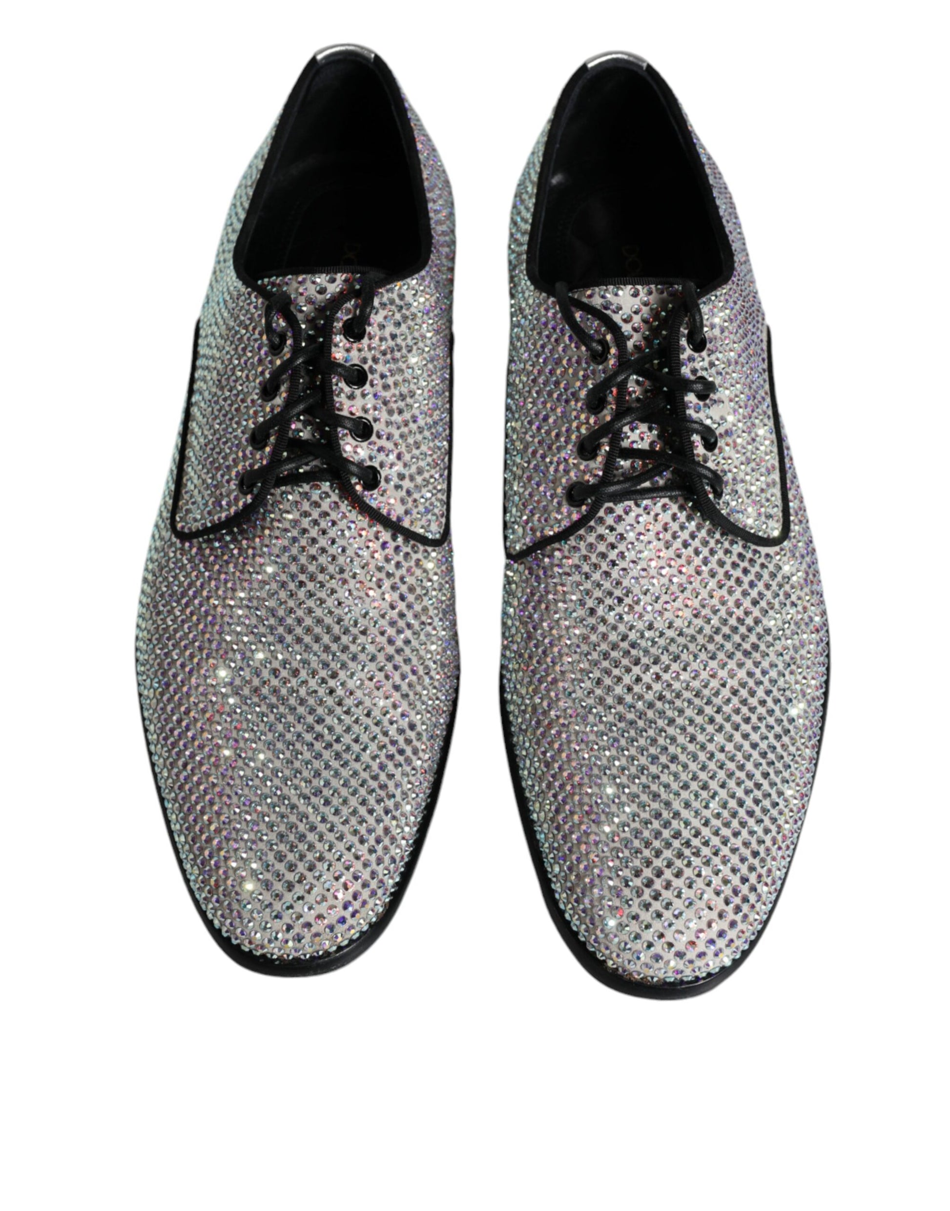 Pair of glittery silver leather dress shoes with rhinestone embellishments