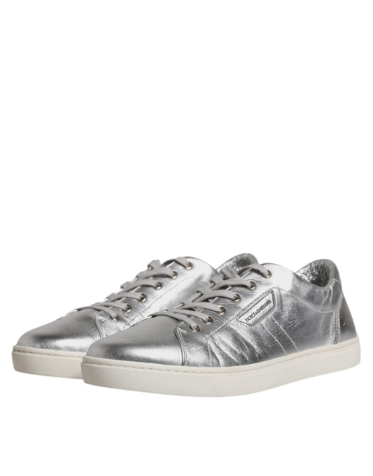 Silver leather sneakers with laces, featuring a low top and a chunky sole