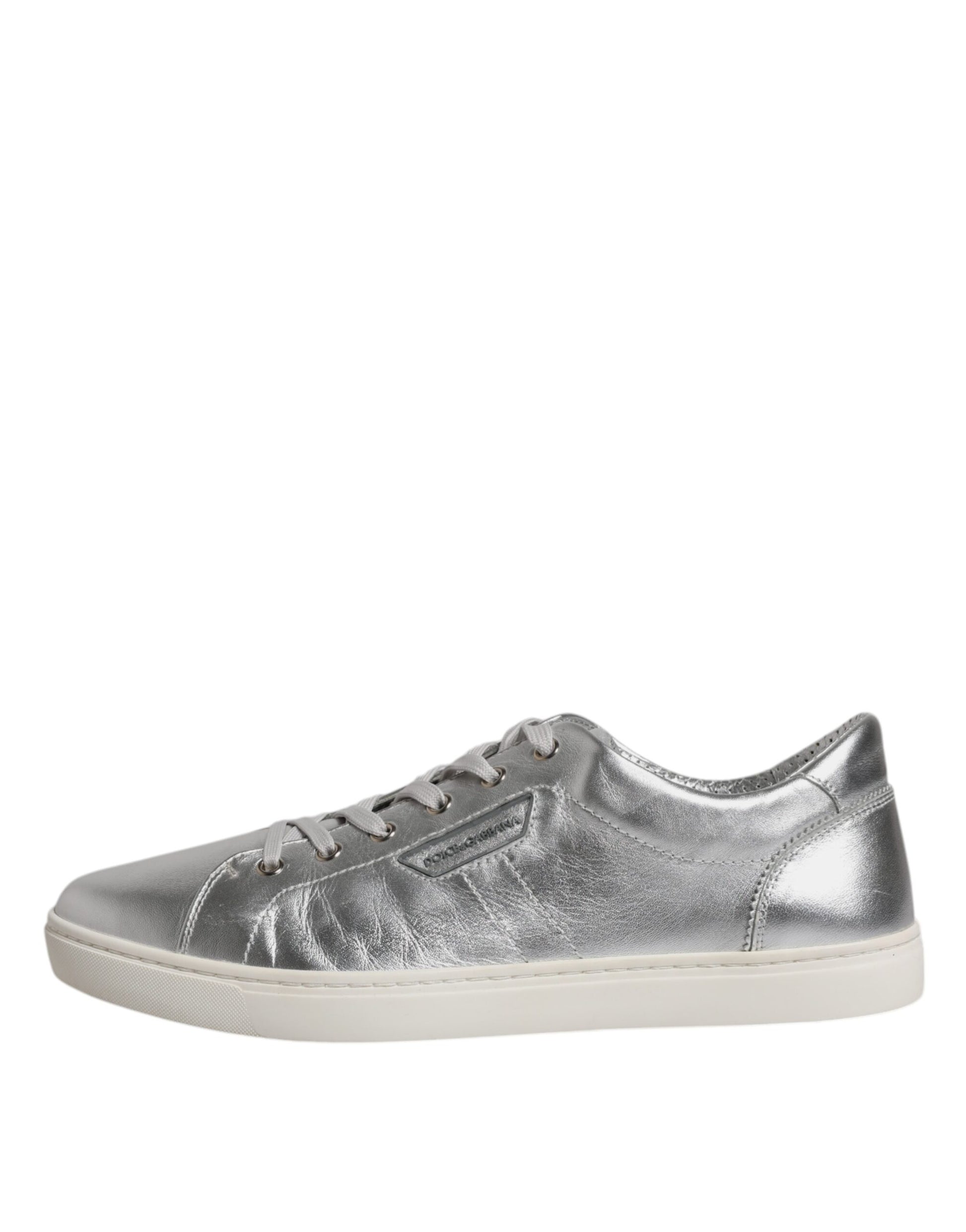 Silver leather sneakers with white soles, featuring a low top and laces