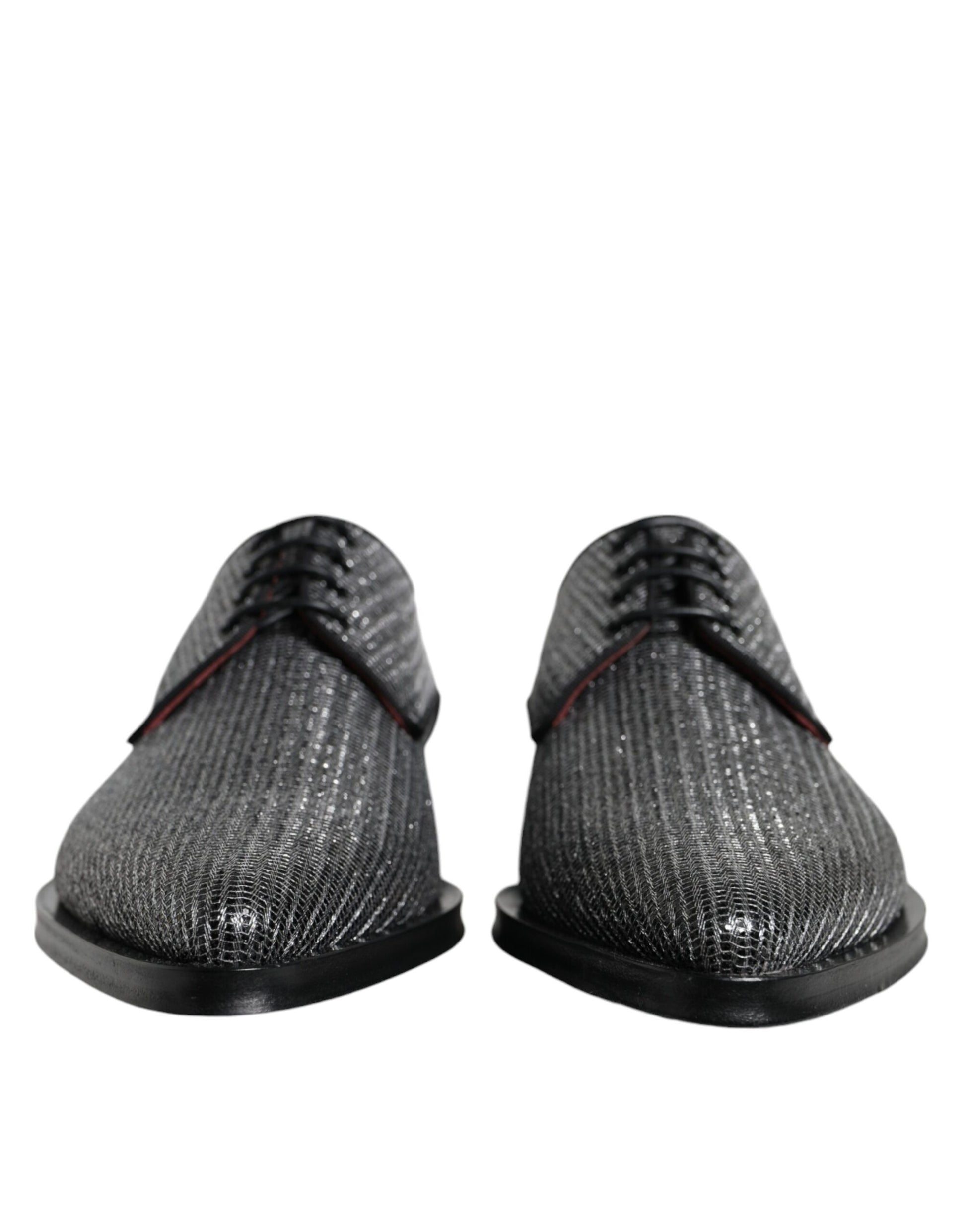 Pair of black dress shoes with a glittery texture