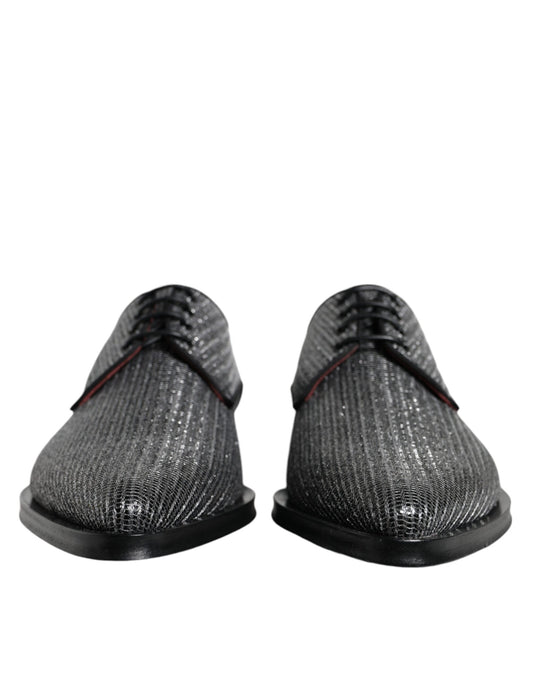 Pair of black dress shoes with a glittery texture