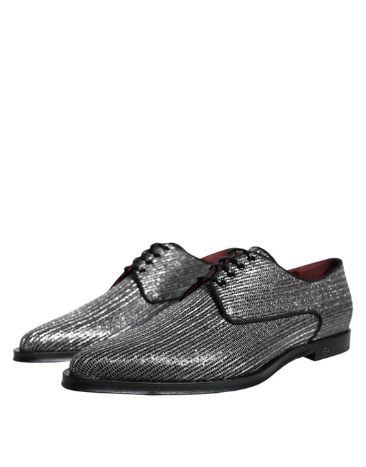 Pair of black dress shoes with red laces