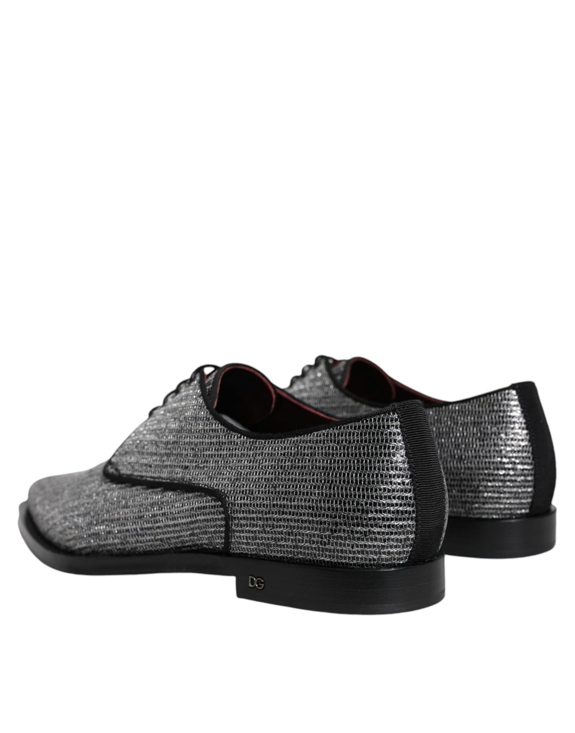 Pair of black dress shoes with a glittery texture