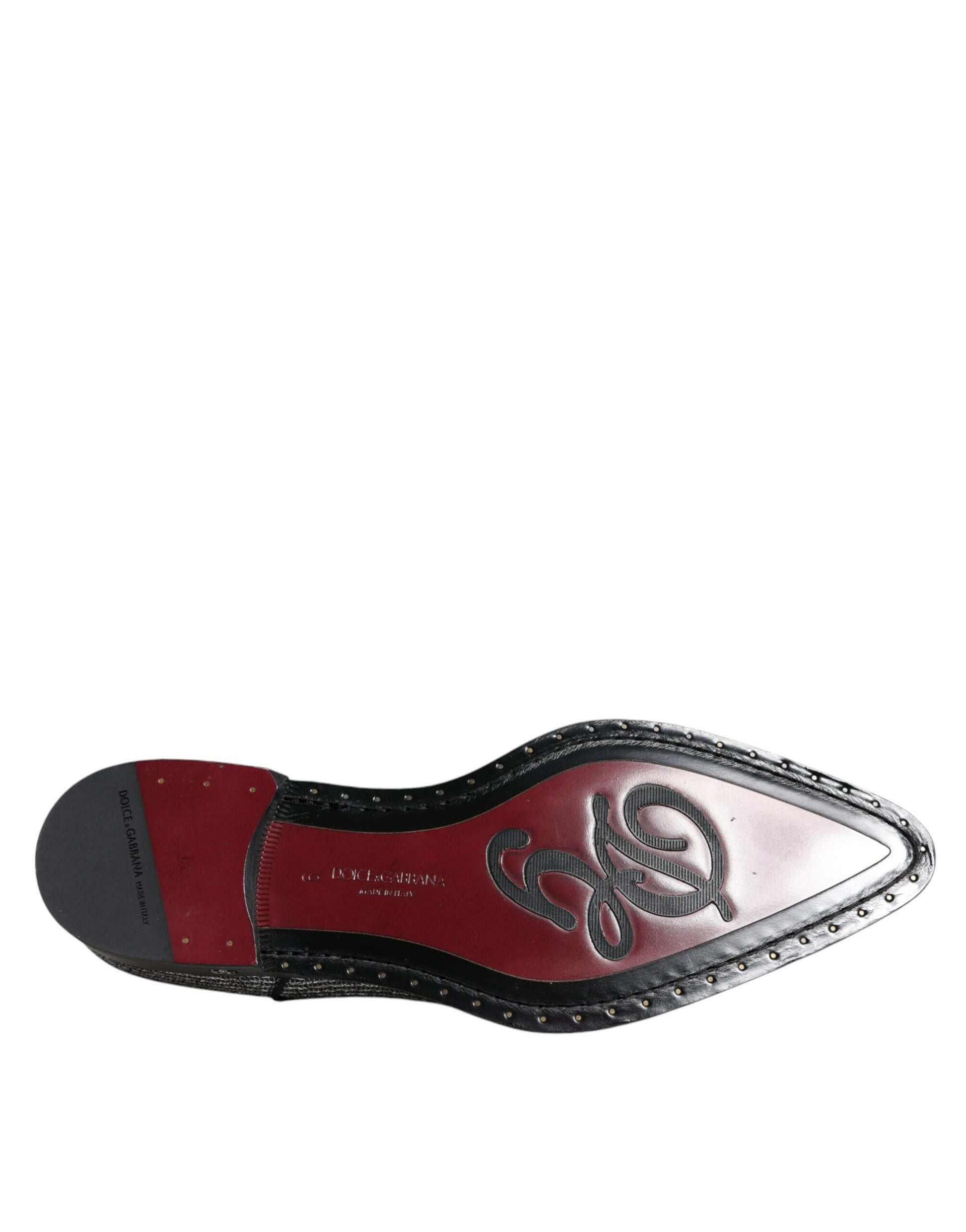 Red sandal with black strap and buckle
