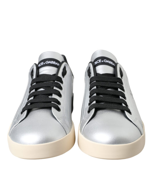 Silver and white sneakers with black laces