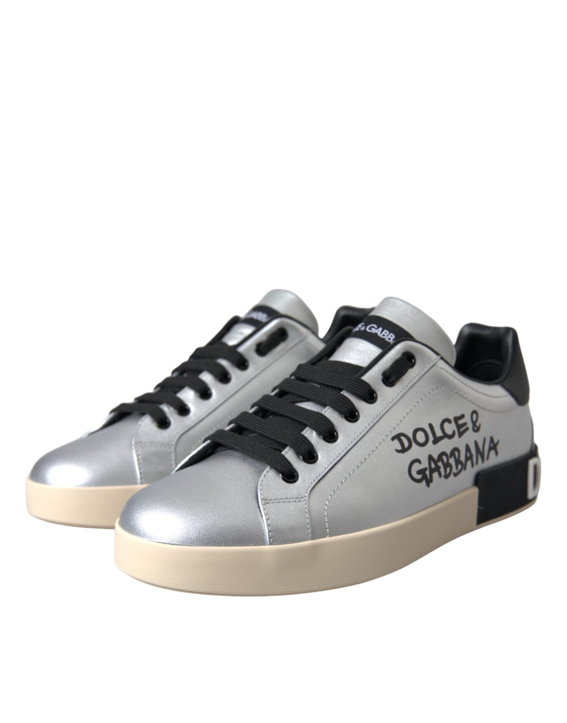 Silver and tan high top sneakers with black laces and white soles