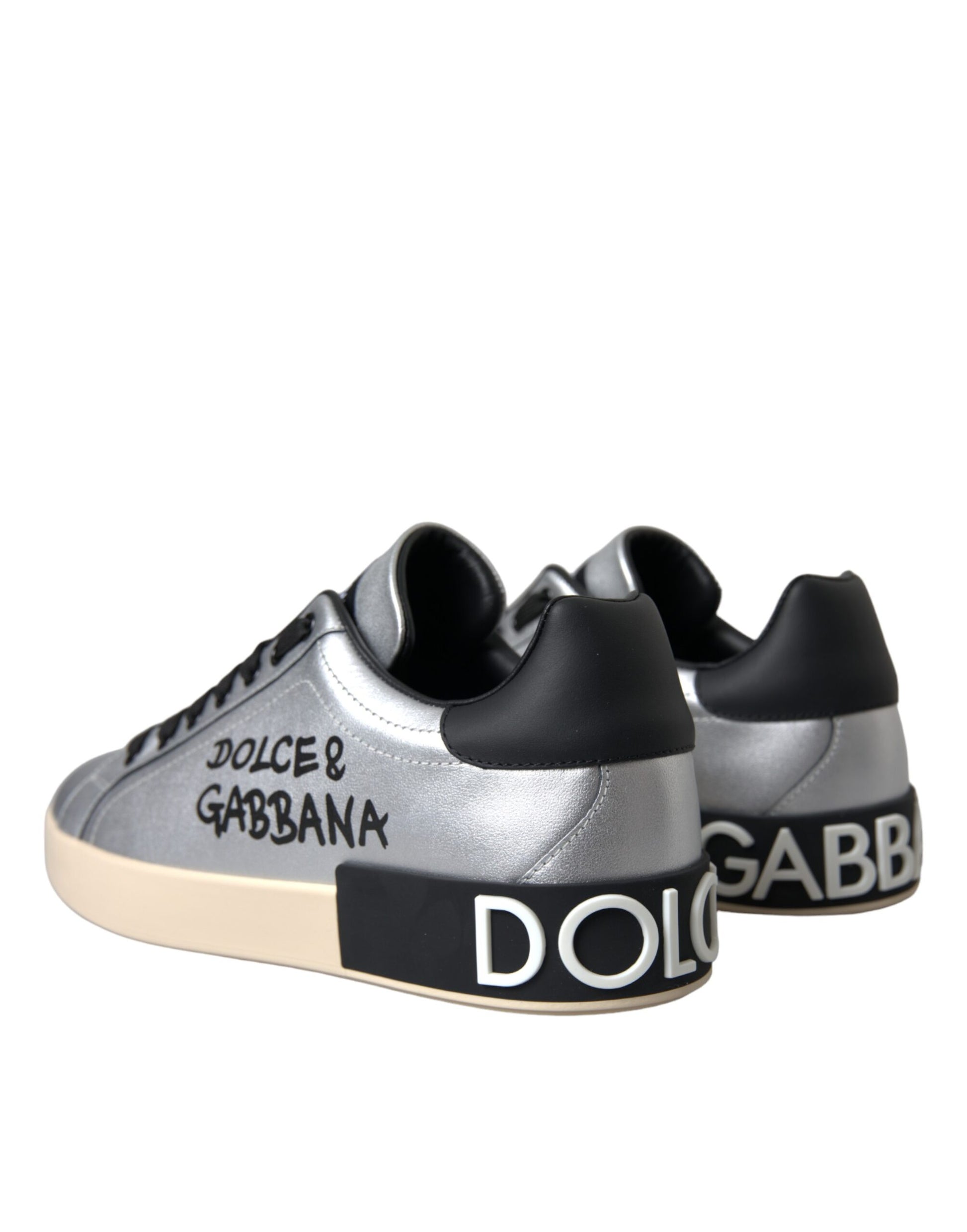 Silver and black sneakers with white soles