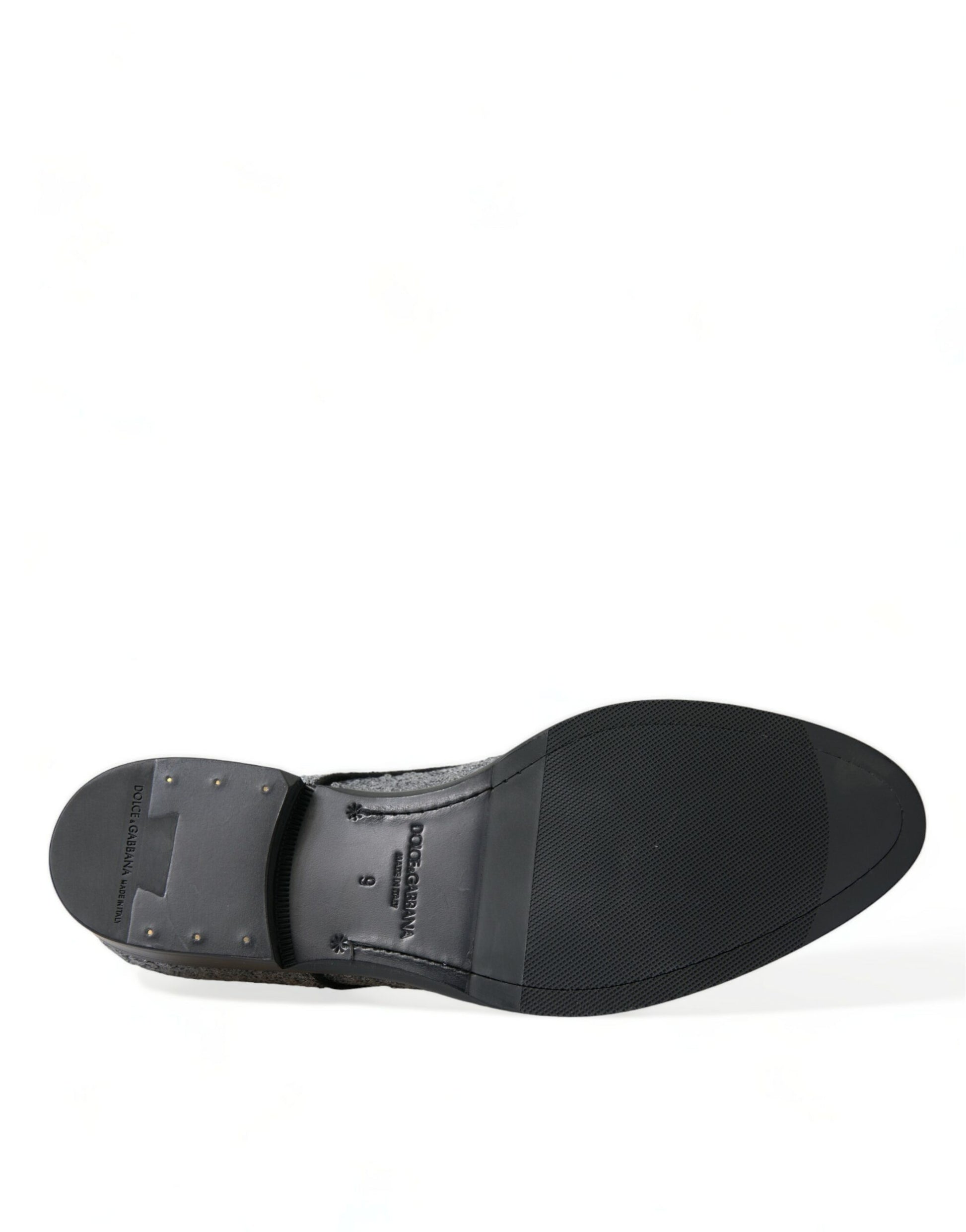 Black sandal with strap over foot and toe loop