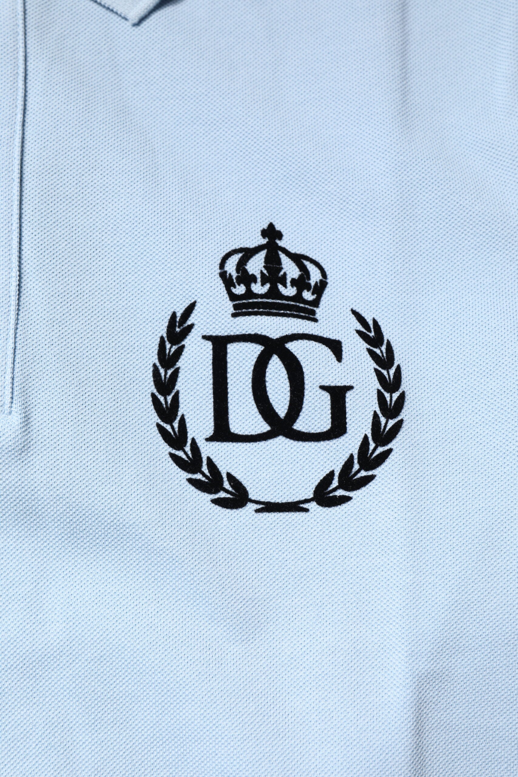 White polo shirt with black logo