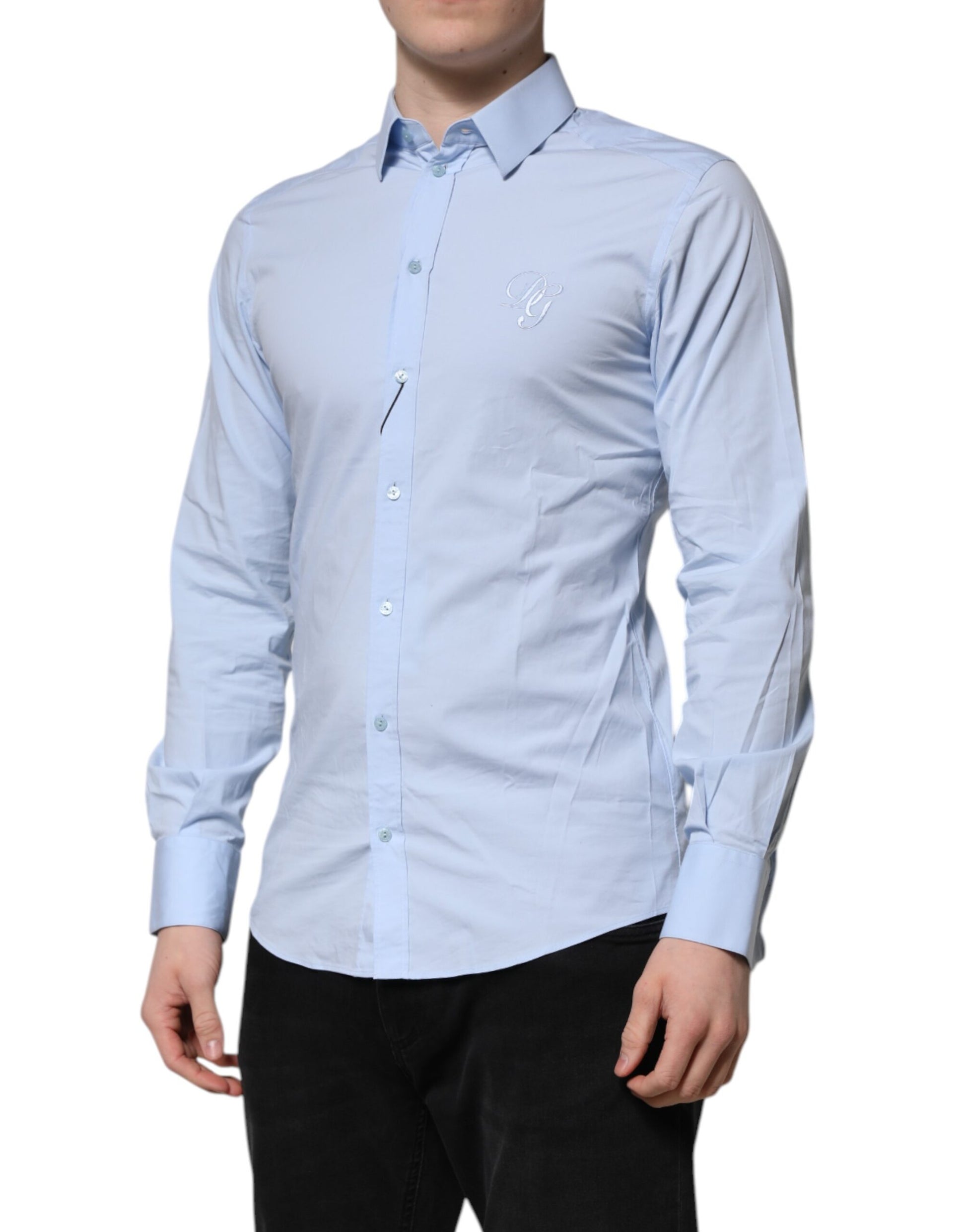 A long sleeve dress shirt in sky blue cotton with gold accents