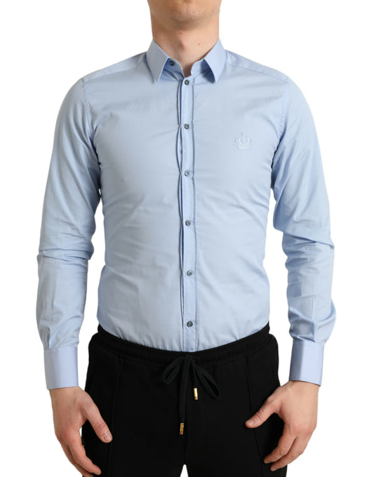 Man wearing blue shirt and black pants
