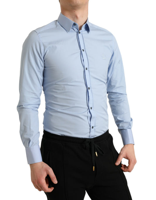 Man wearing blue shirt and black pants