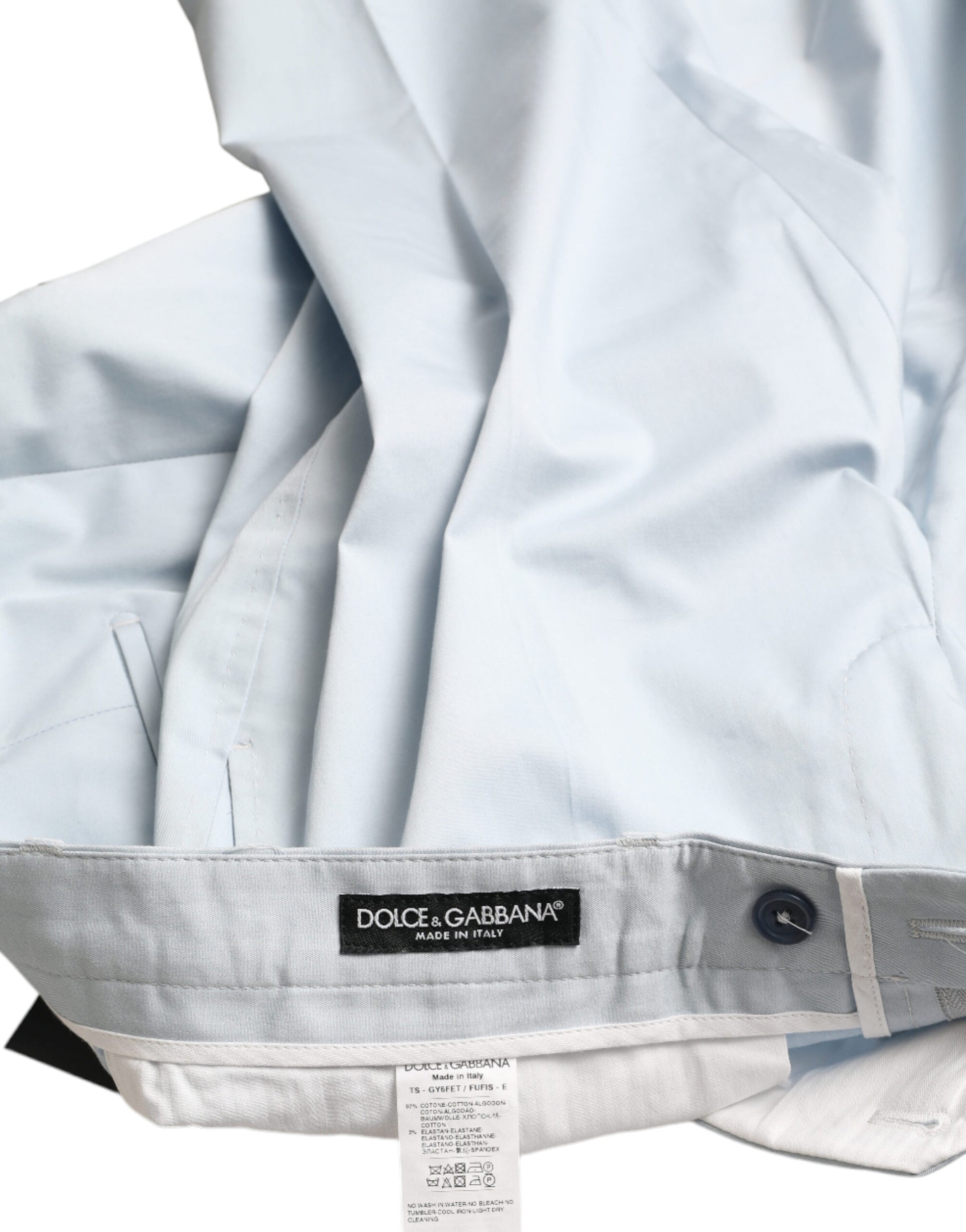 Light blue raincoat with black buttons and label