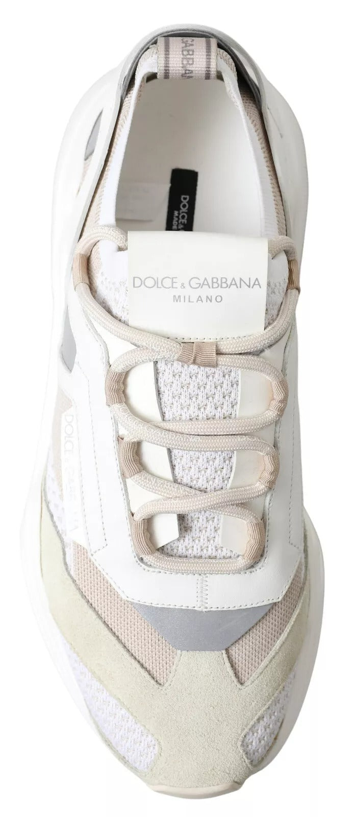 White sneaker with tan laces and gold accents