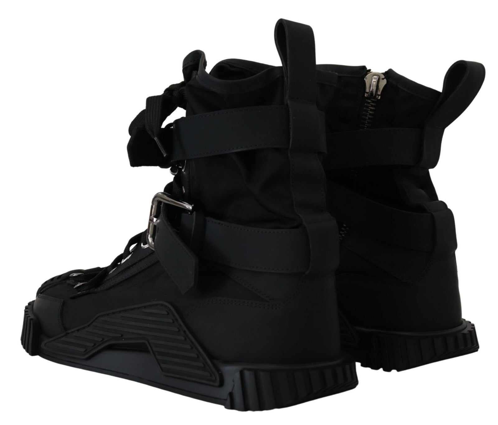 Pair of black boots with straps and buckles