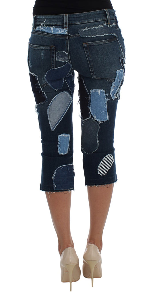Pair of distressed jeans with patches on legs