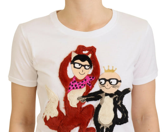 Embroidered graphic on a white t-shirt featuring two cartoon monkeys and a cat