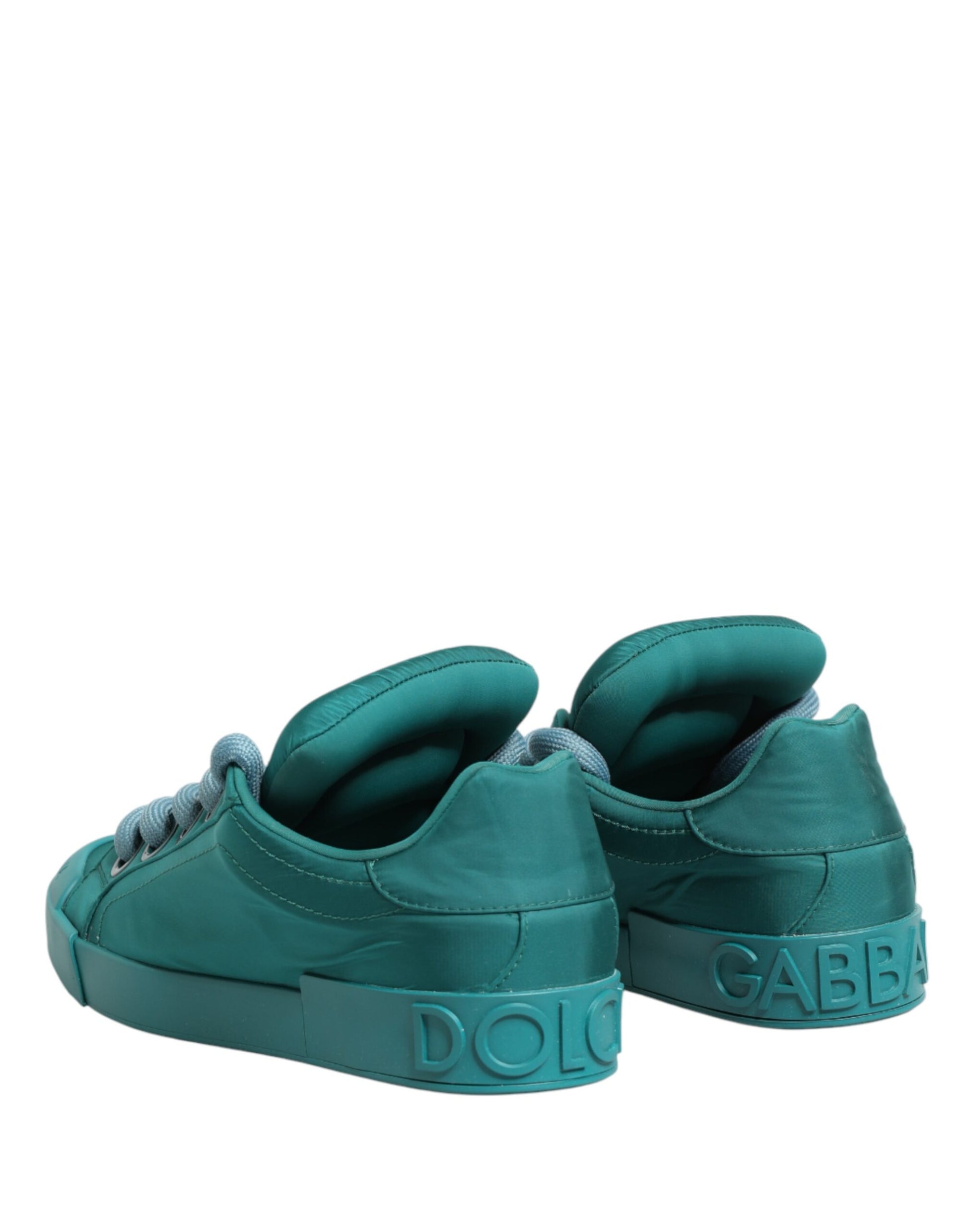 A pair of teal men's sneakers with white laces and the brand name "Dolce & Gabbana" on the side