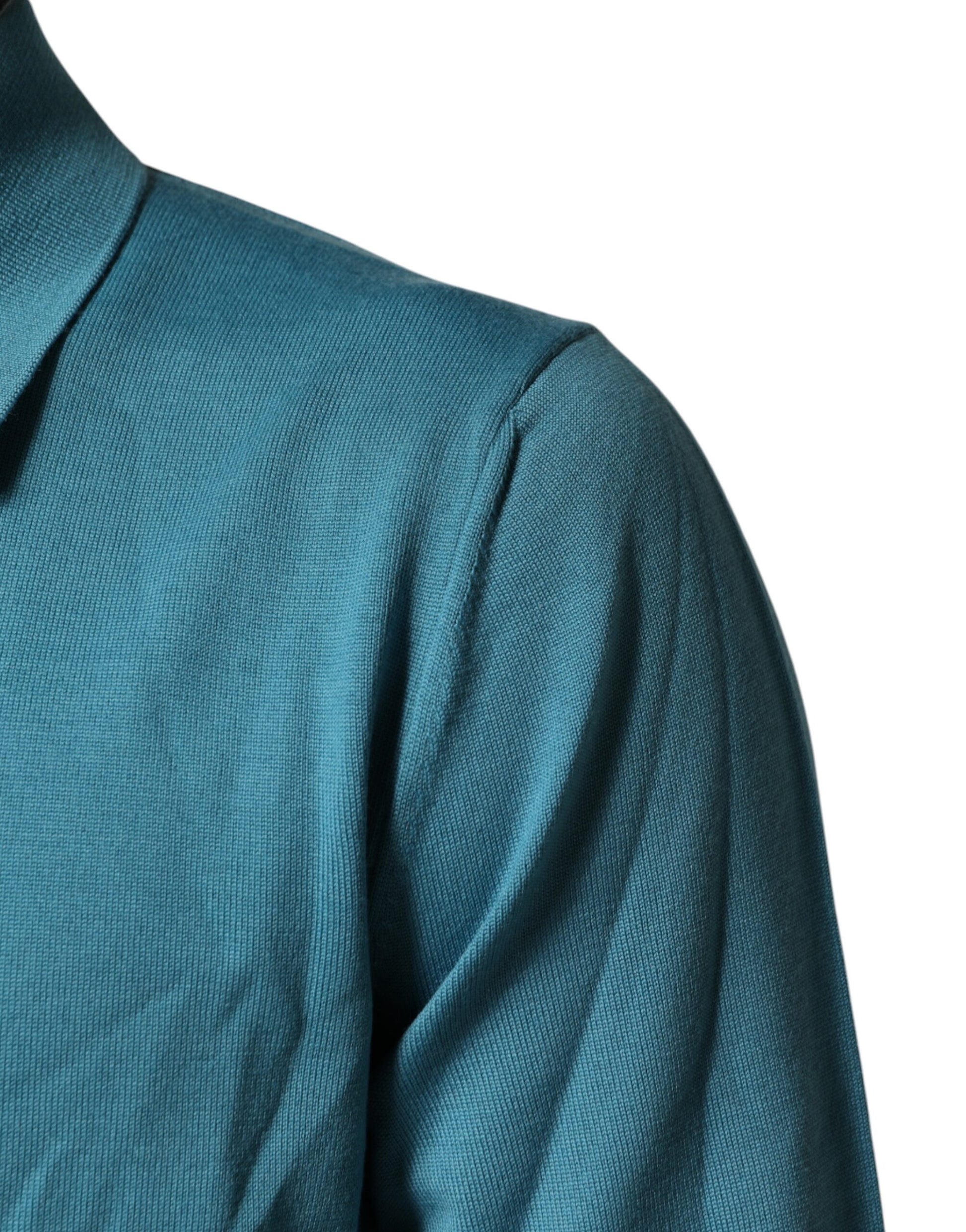 The shirt is blue in color