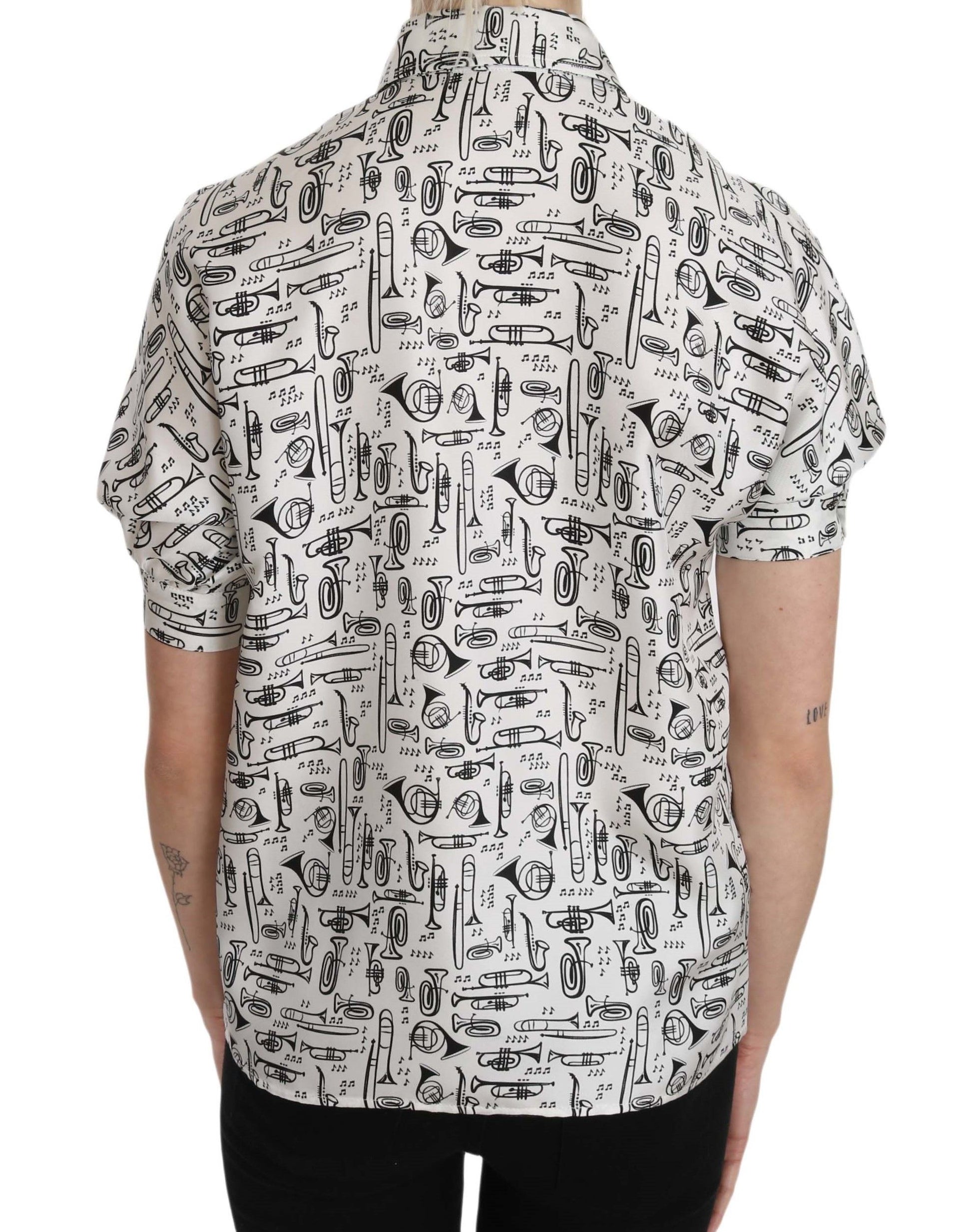 Short sleeve shirt with black and white pattern featuring various objects
